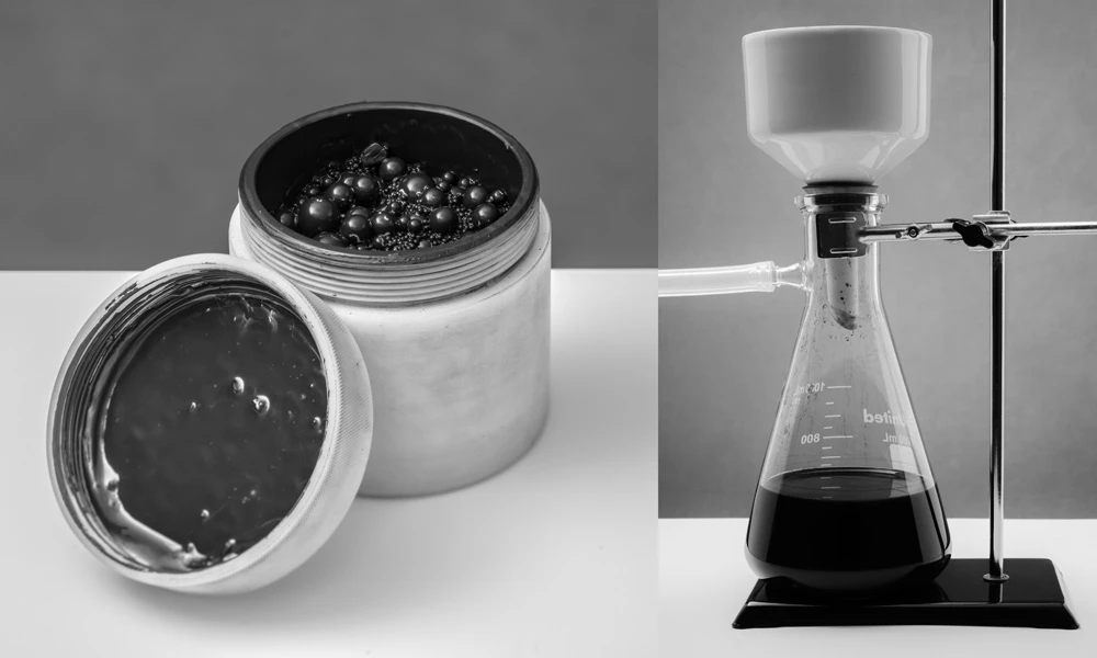 Milling jar with milling media and charcoal slurry, left, vacuum filtration system